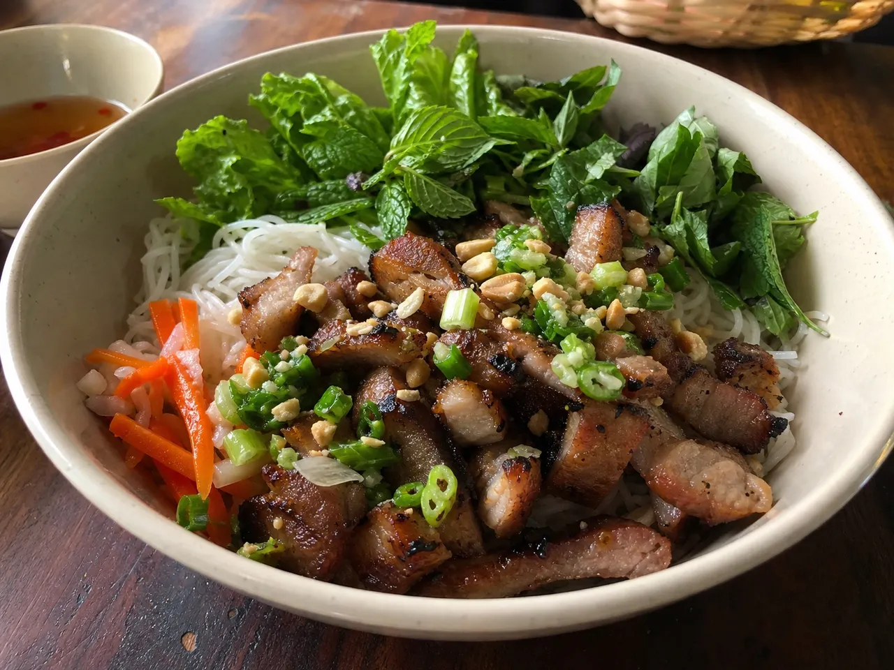 Bún Thịt Nướng (Cold Noodle Salad with Grilled Pork) — served