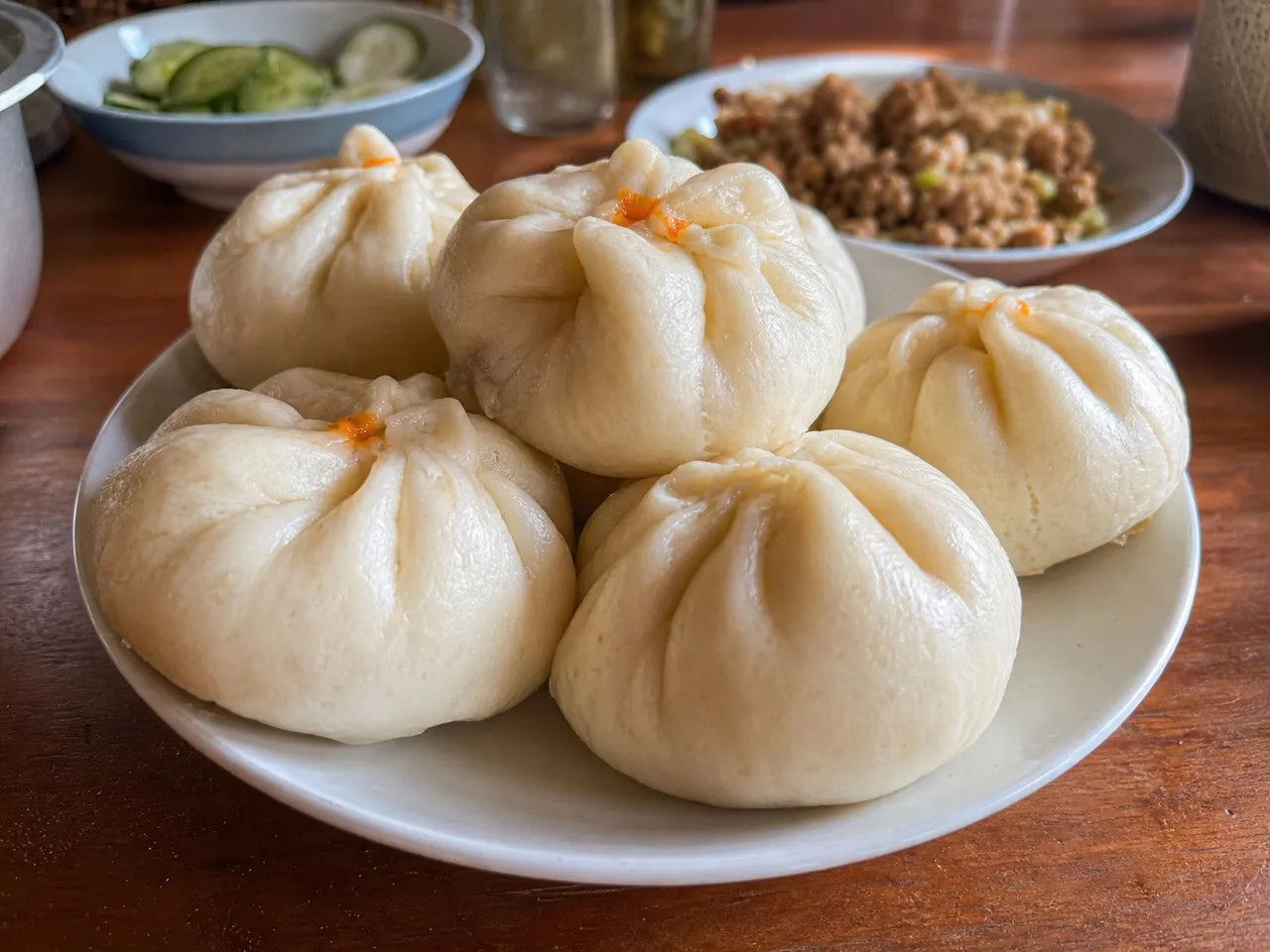 Bánh Bao (Steamed Pork Buns) — served