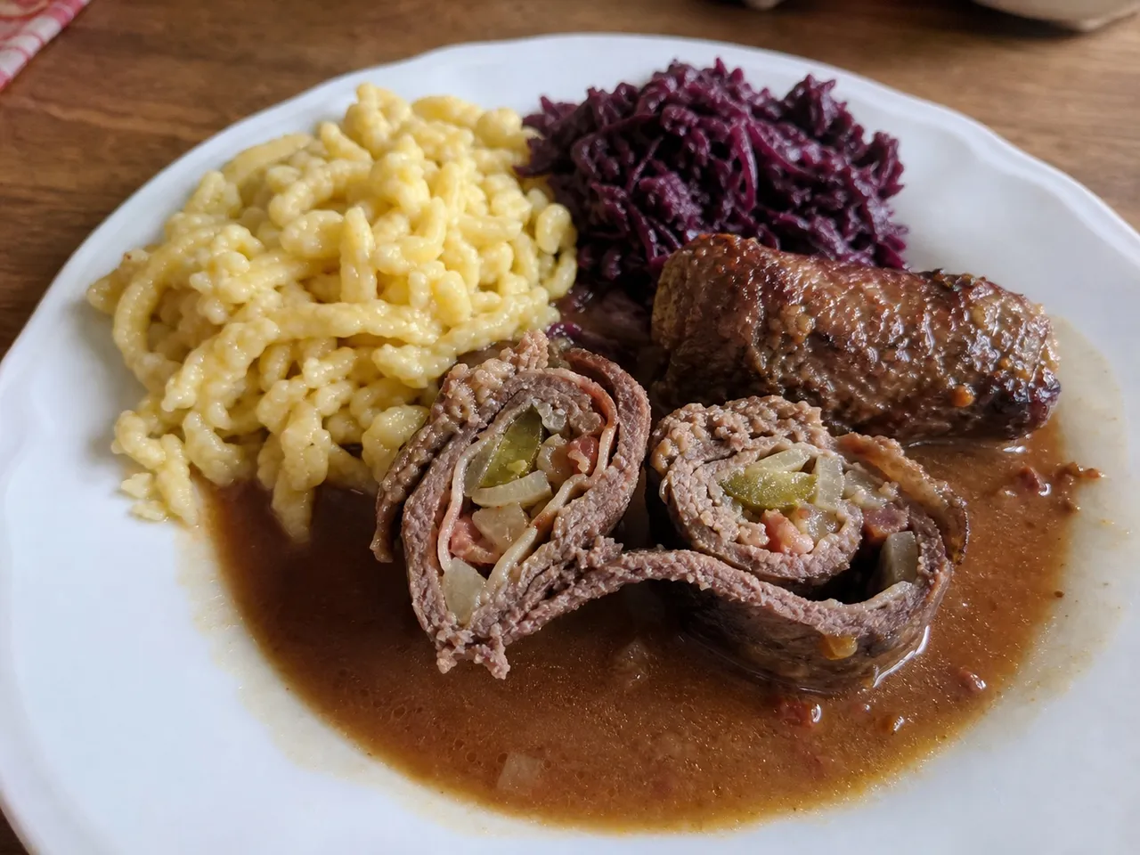 Beef Rouladen with Bacon, Onion, and Pickle — served