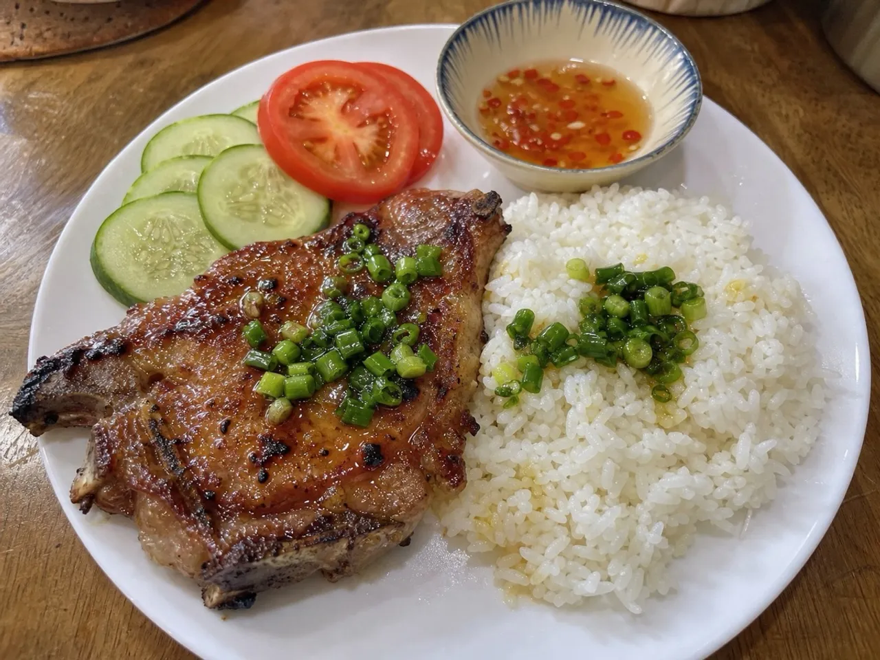 Cơm Tấm (Broken Rice with Grilled Pork) — served