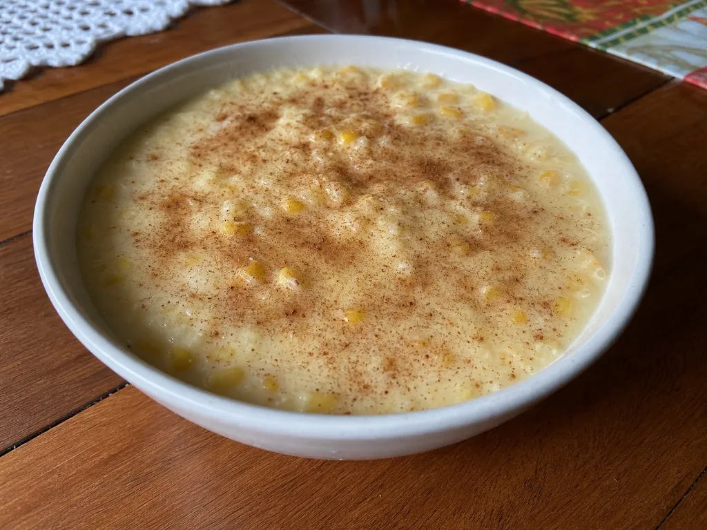 Canjica (Sweet Corn and Coconut Pudding) — plated and served