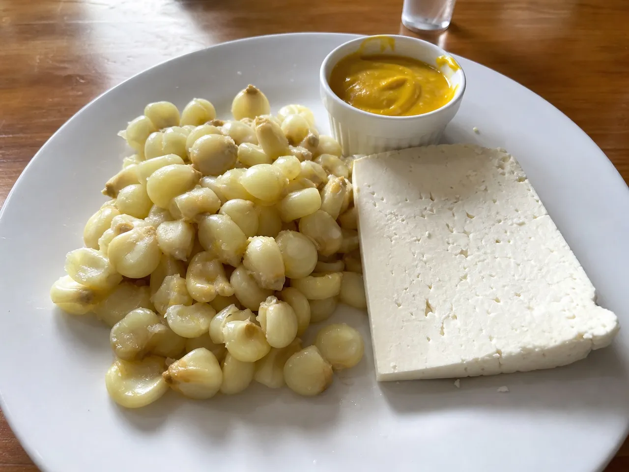 Choclo con Queso (Peruvian Corn with Cheese) — served