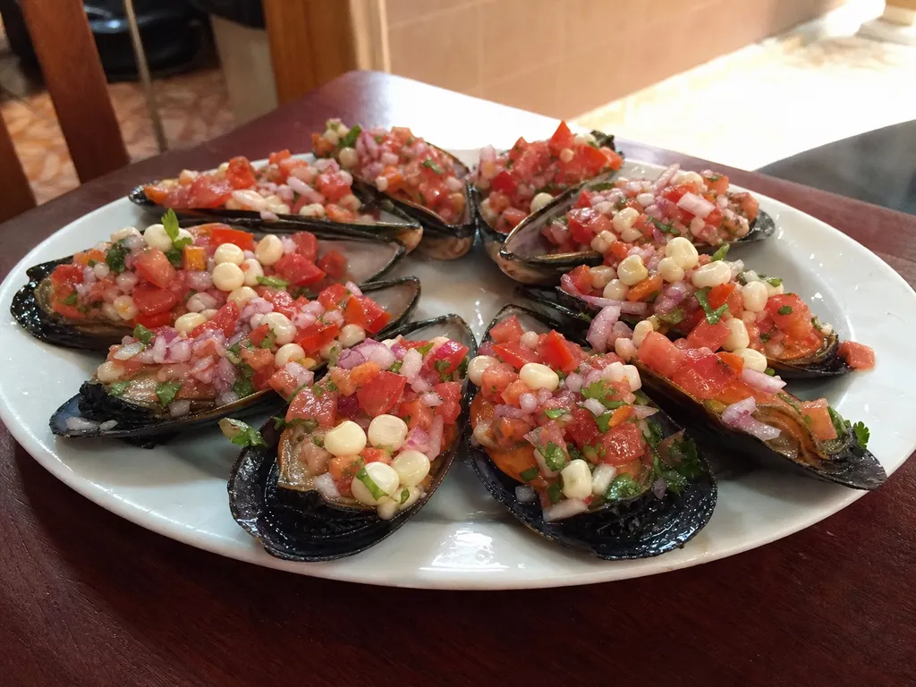 Choritos a la Chalaca (Mussels with Peruvian Salsa) — plated and served