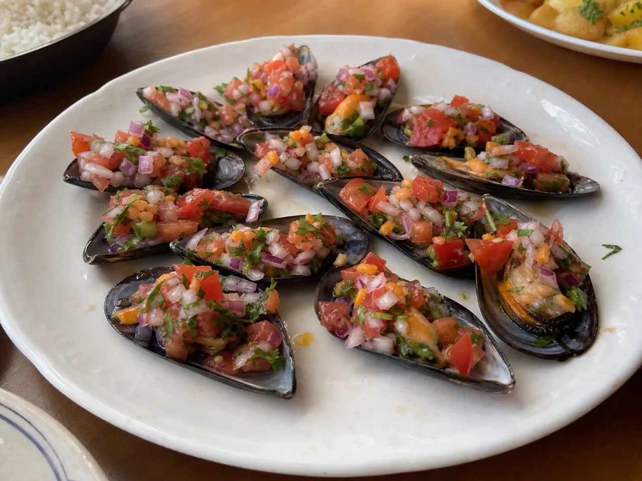 Choritos a la Chalaca — served