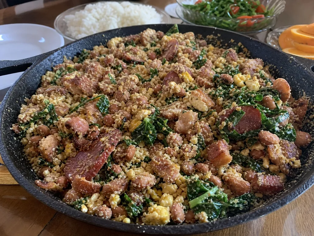 Feijão Tropeiro (Brazilian Beans with Bacon and Eggs) — plated and served