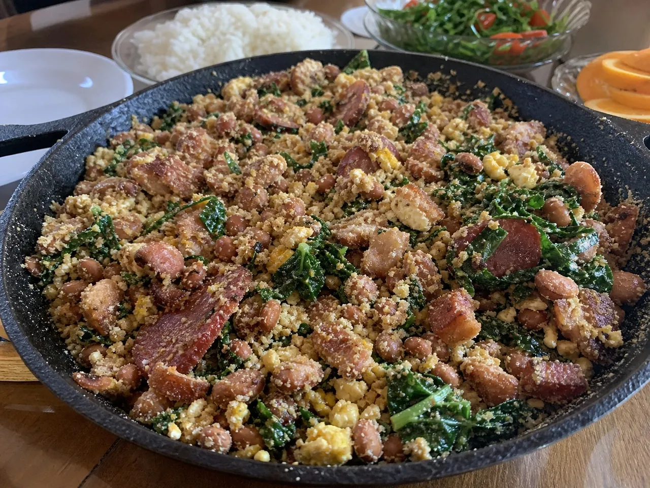 Feijão Tropeiro (Brazilian Beans with Bacon and Eggs) — served