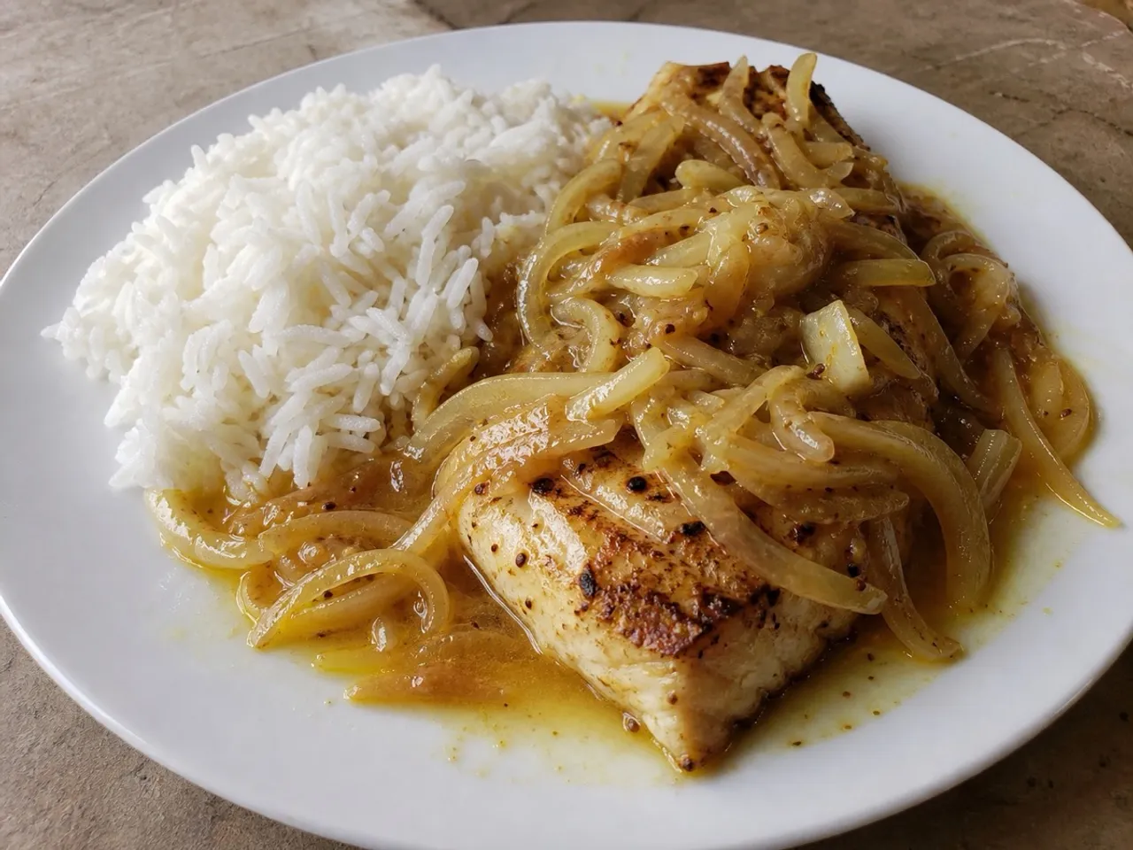 Fish Yassa — served