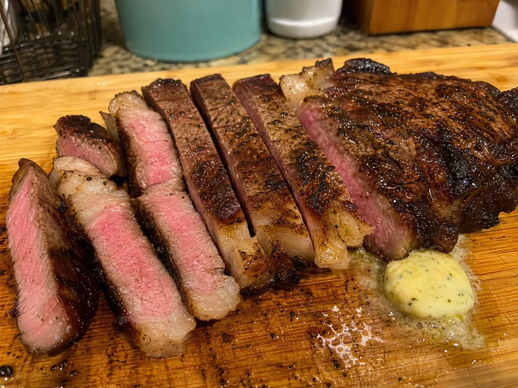 Grilled Ribeye Steak — plated and served