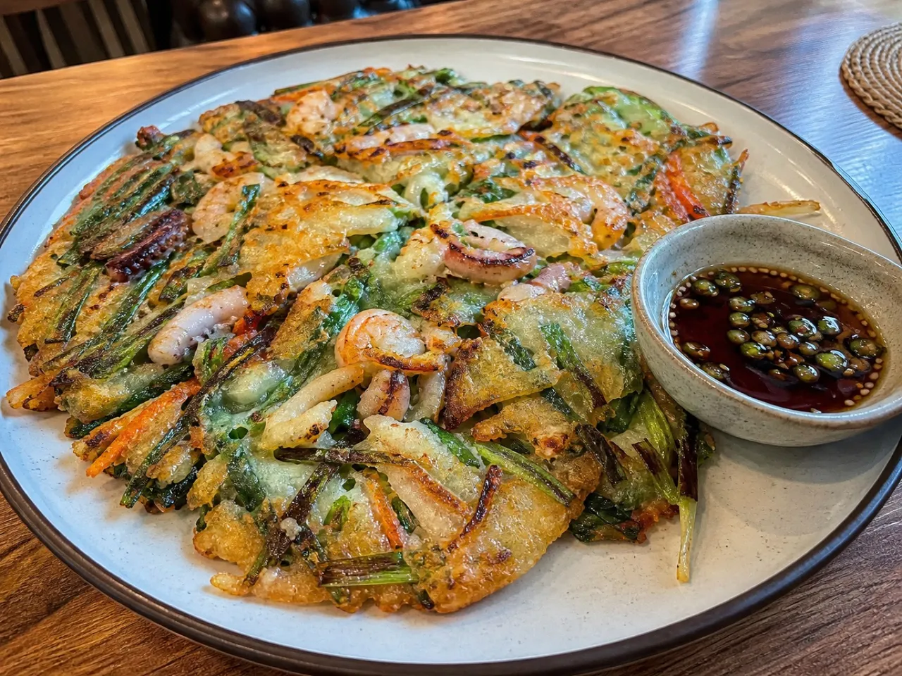 Haemul Pajeon (Seafood Scallion Pancake) — served