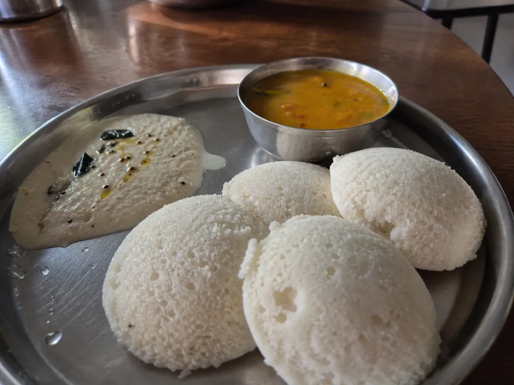 Idli — plated and served