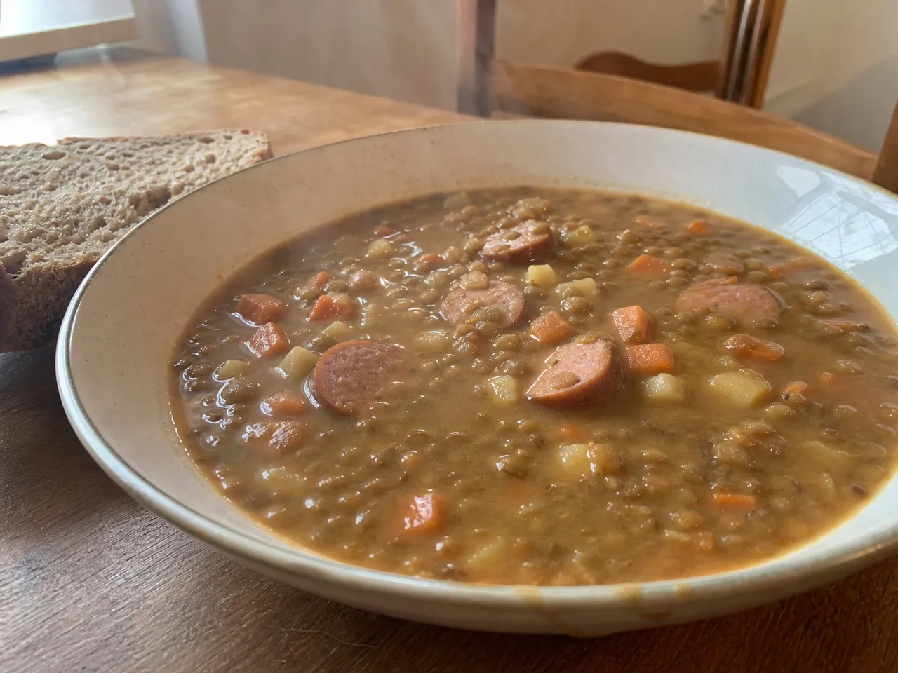 Linsensuppe (German Lentil Soup with Sausage) — served