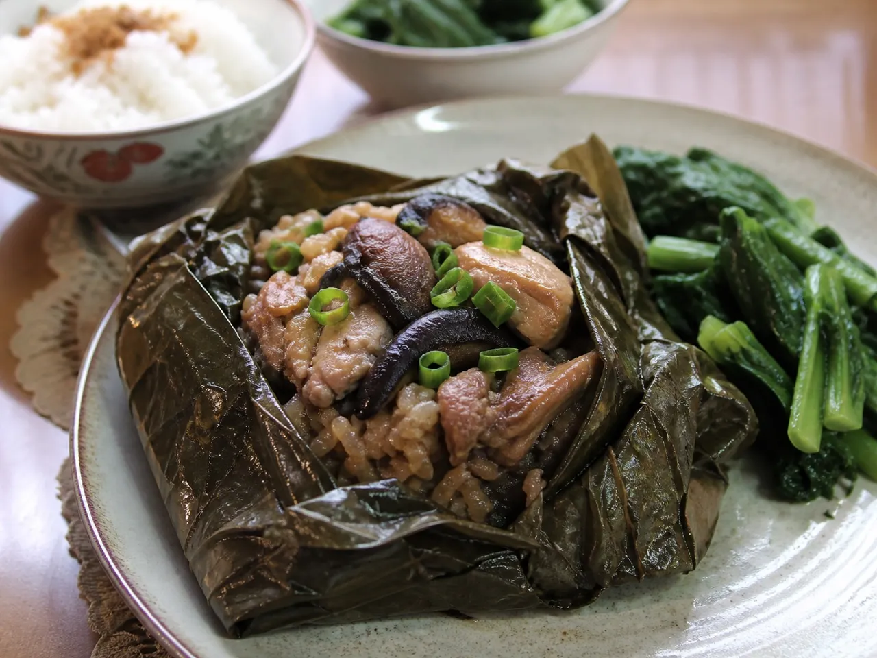 Lo Mai Gai (Sticky Rice in Lotus Leaf) — served