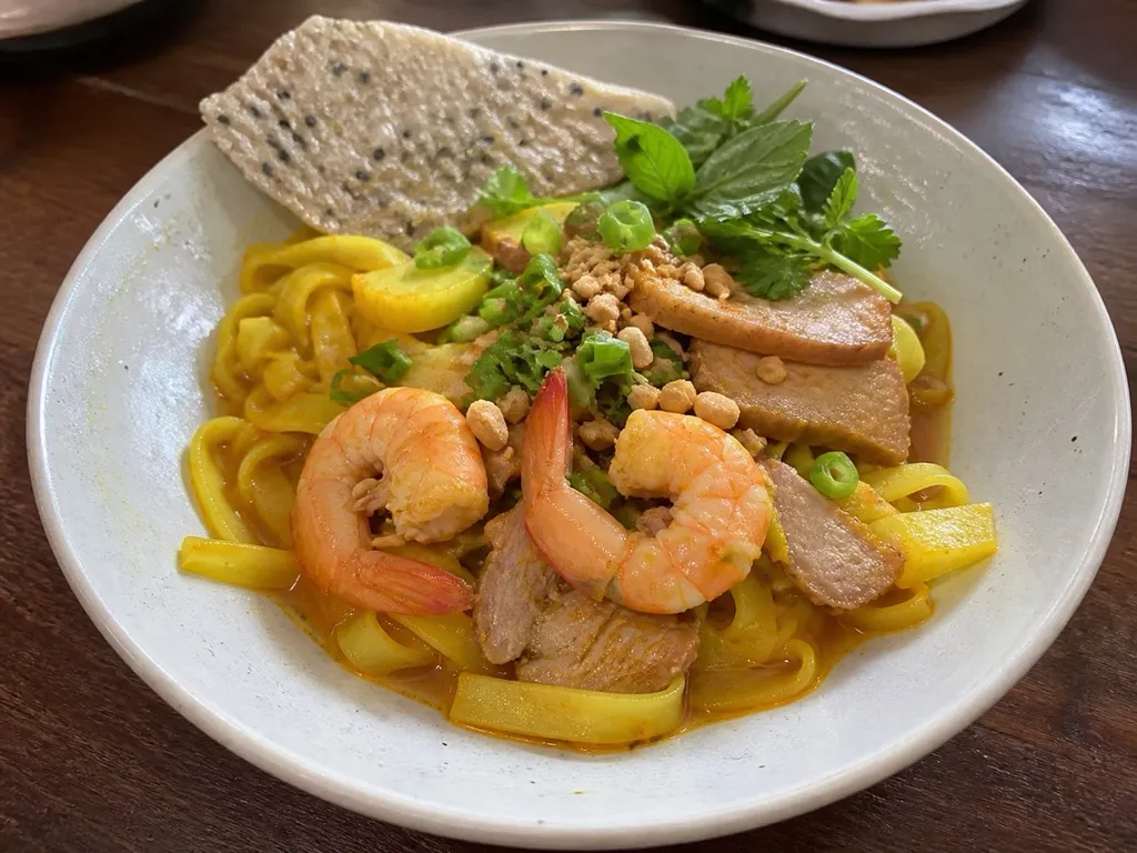Mì Quảng (Turmeric Noodle Soup) — plated and served