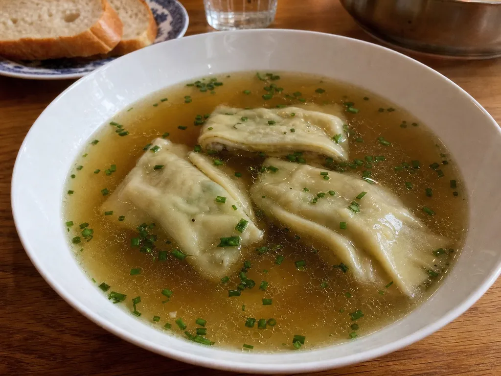 Maultaschen (German Meat-Filled Dumplings) — plated and served