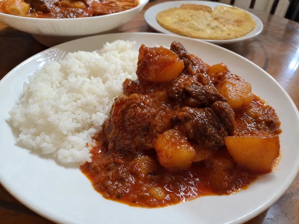 Mechado — plated and served