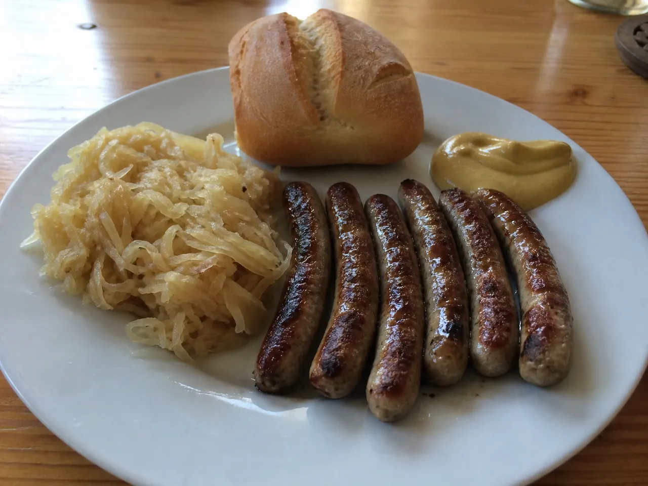 Nürnberger Rostbratwurst (Nuremberg Grilled Sausages) — served
