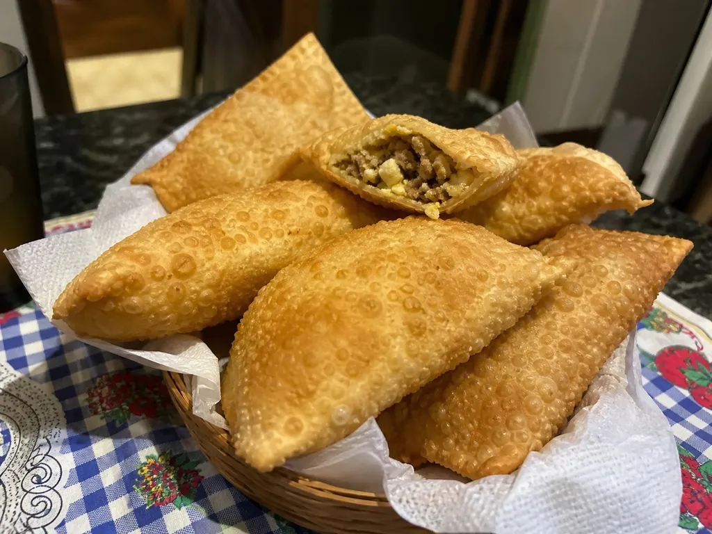 Pastel de Carne (Fried Beef Pastry) — plated and served