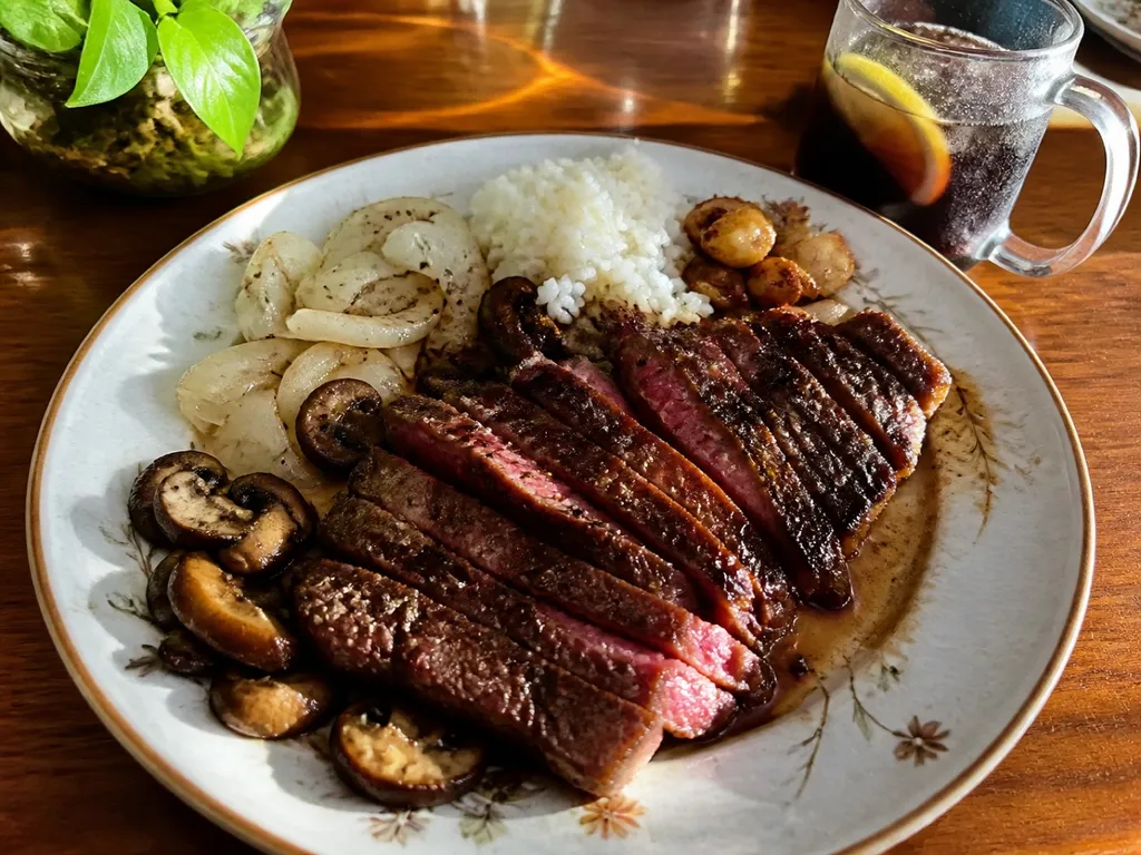 Perfect Pan-Seared Ribeye Steak — plated and served
