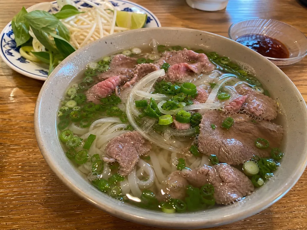 Pho Bo (Vietnamese Beef Noodle Soup) — plated and served