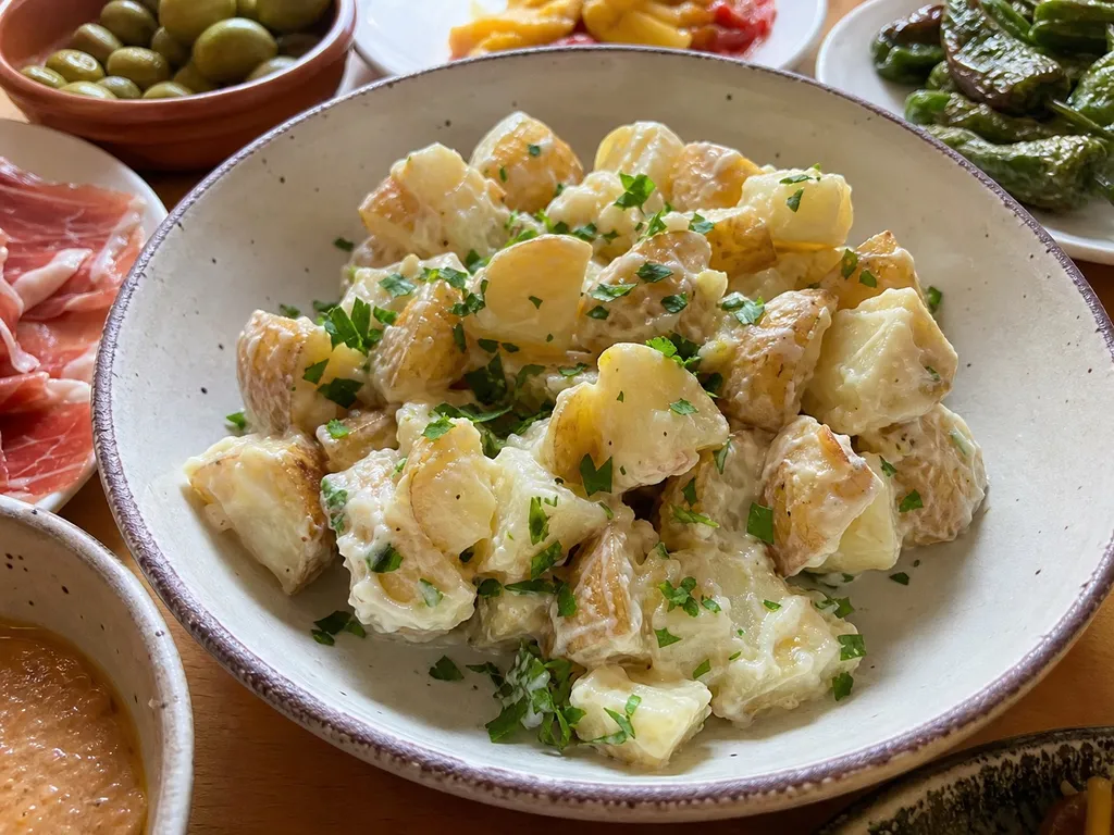 Potatoes Tapas in Garlic Mayonnaise (Patatas Aioli) — plated and served