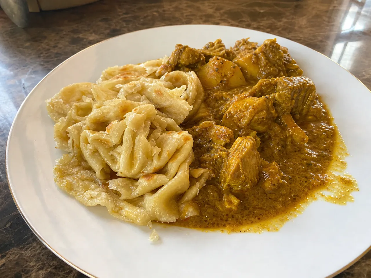 Roti (Buss Up Shut) — served