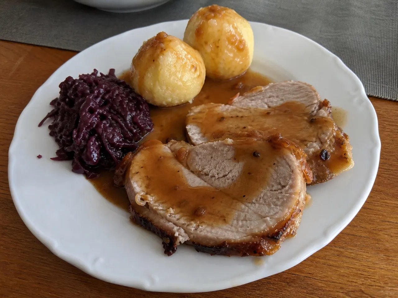 Schweinebraten (German Pork Roast with Gravy) — served