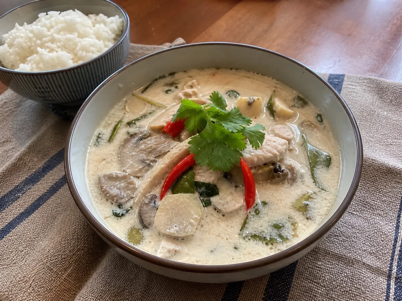 Tom Kha Gai (Thai Coconut Chicken Soup) — served